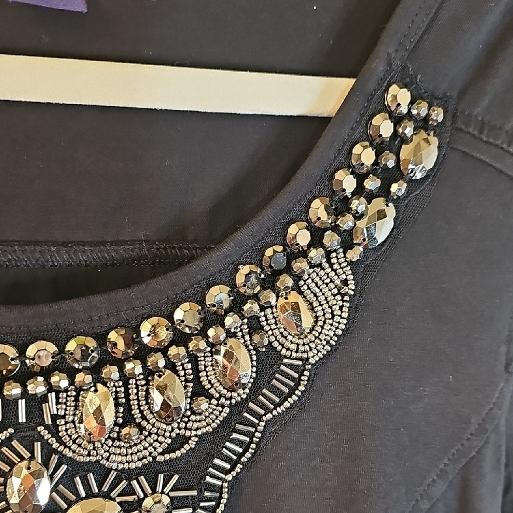 Chic Black Mini Dress with Embellished Neckline - Picture 8 of 10